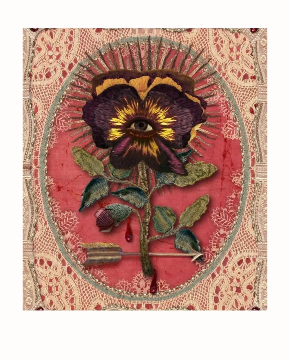 Two embroidered artworks side by side, one with a sun design and eye, the other with a floral design.