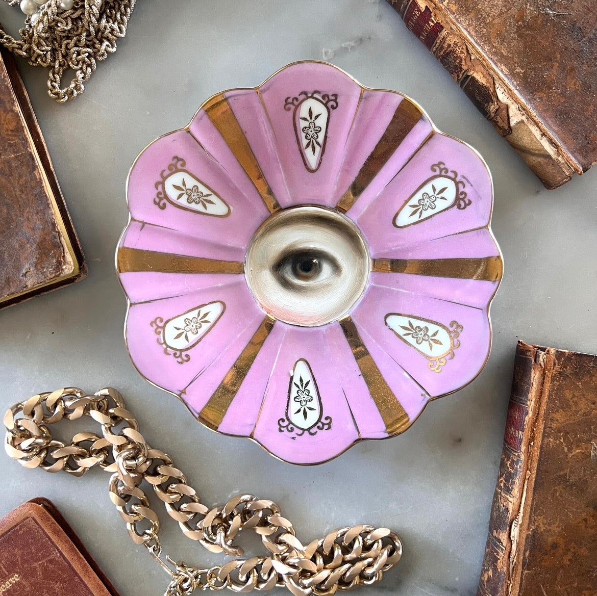 No. 3566 Lover's Eye Painting on a Pink & Gold Plate
