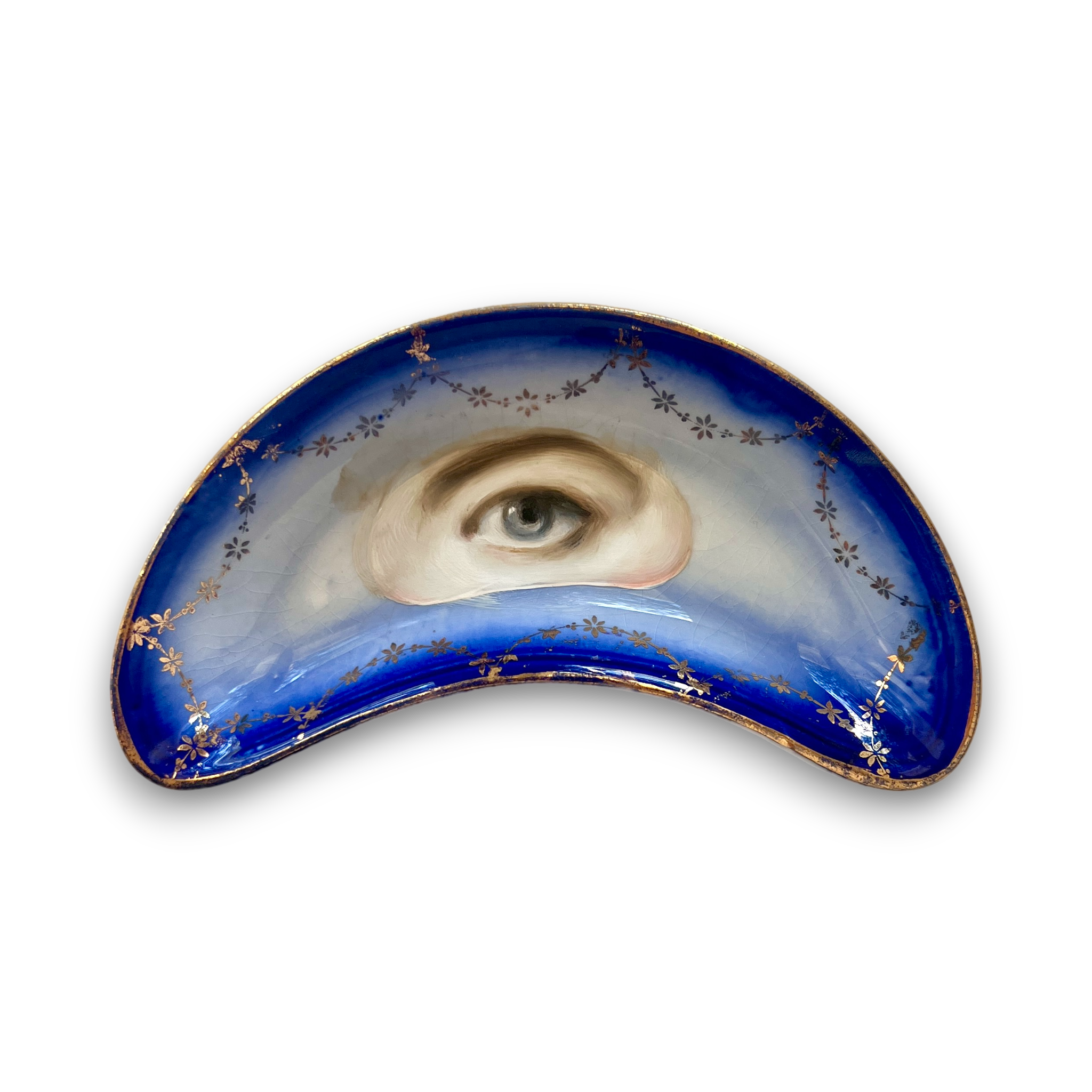 No. 3130 Lover's Eye Painting on a Blue & Gold Garland Crescent Plate