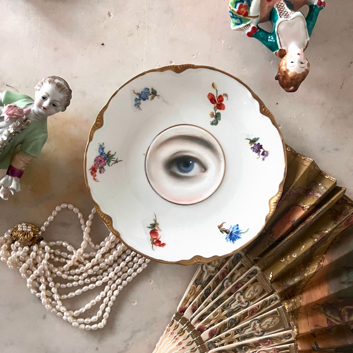 No. 2968 Lover's Eye Painting on a Botanical Plate with a Gold Border.