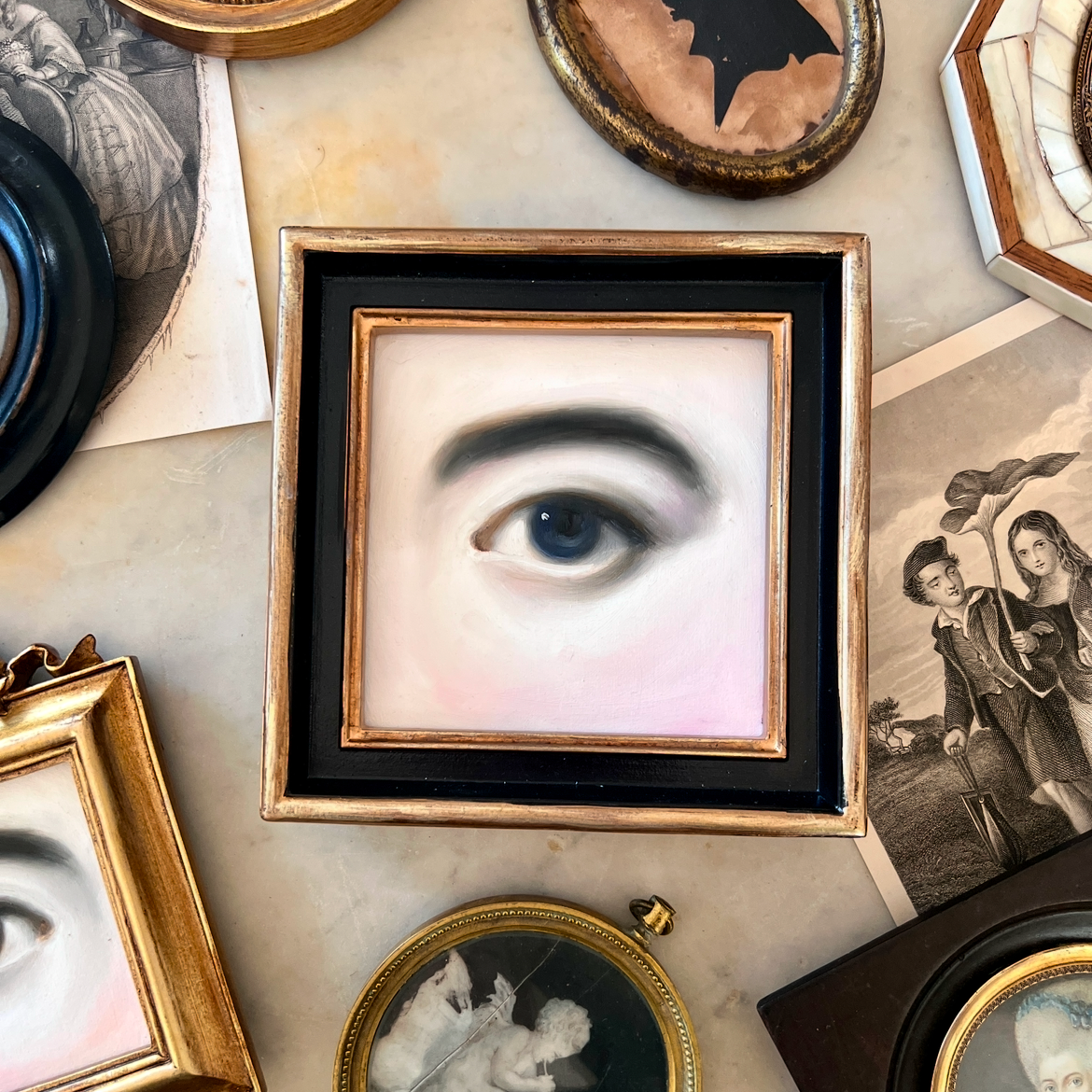 No. 2975 Lover's Eye Painting in a Black & Gold Square Frame