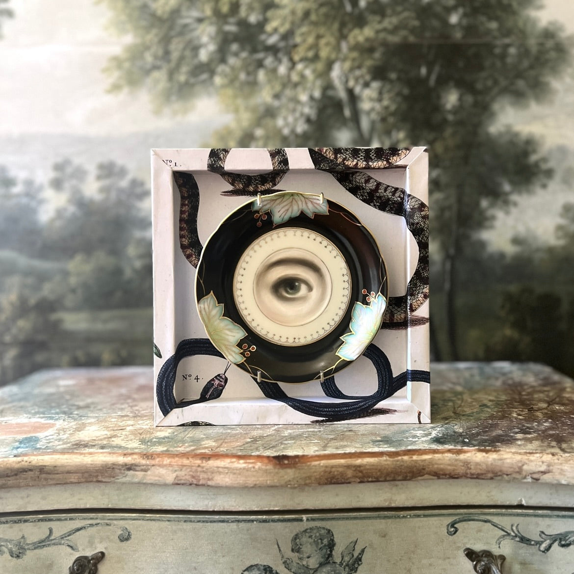 No. 3200 Lover's Eye Painting on a Black, White, and Green Plate