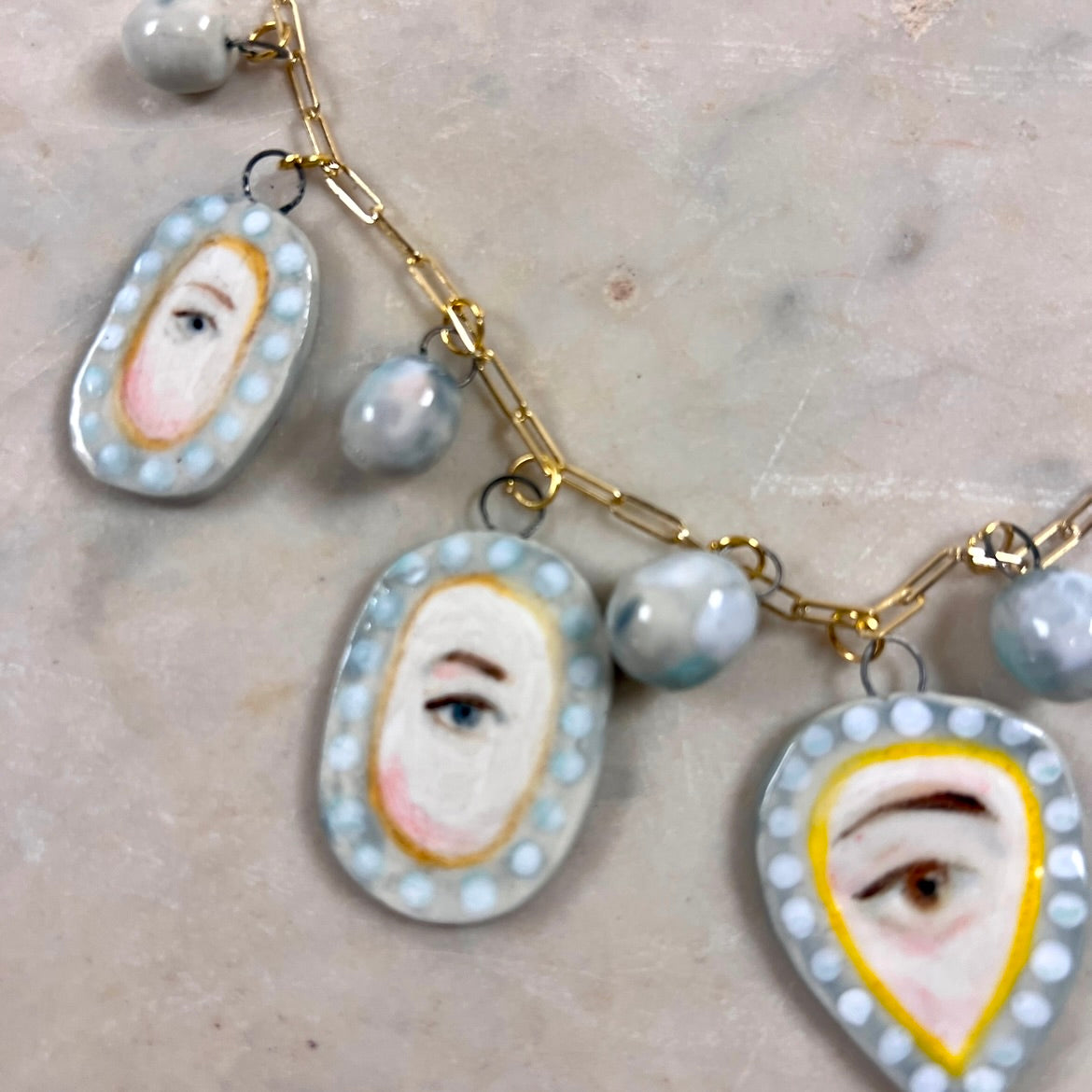 No. 82 Lover's Eye Pearl Charm Necklace with 10k Gold Chain