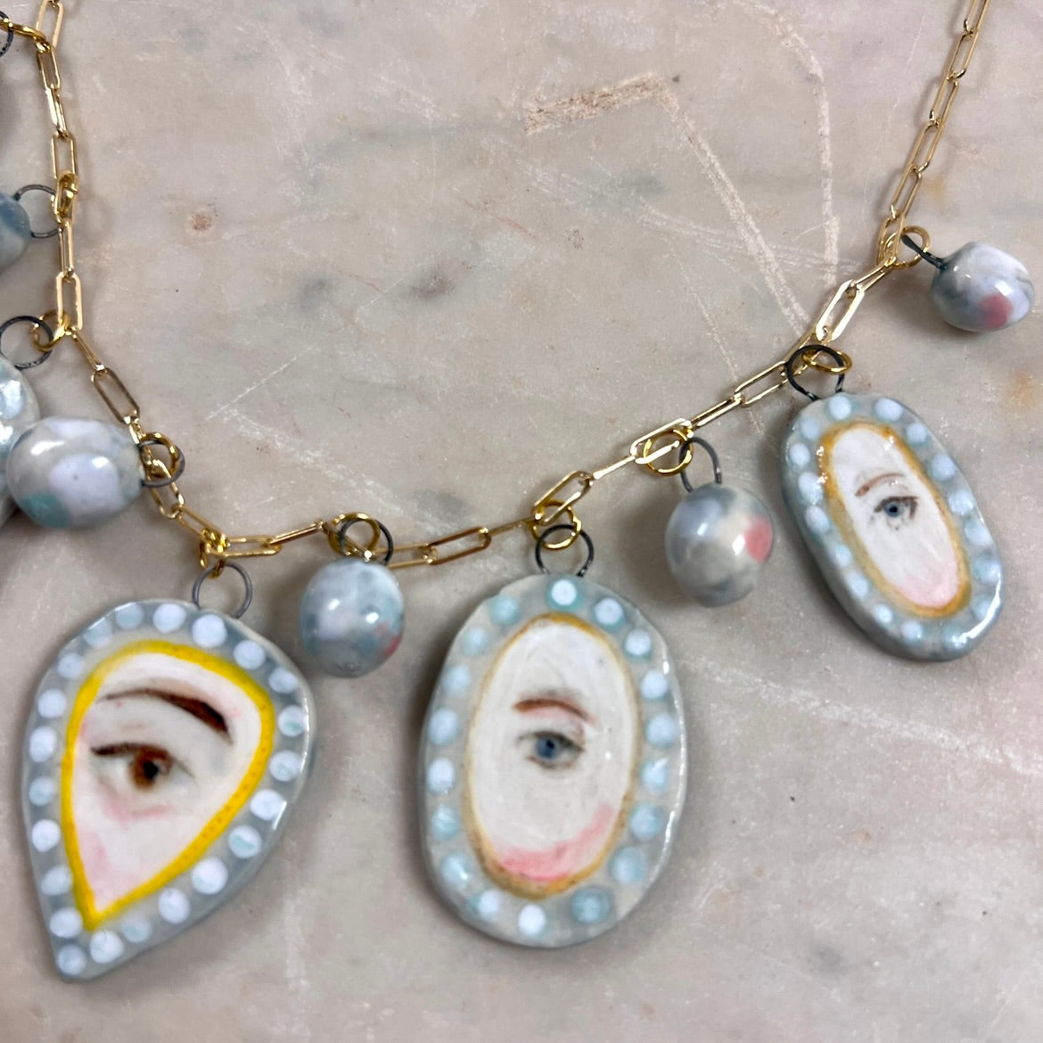 No. 82 Lover's Eye Pearl Charm Necklace with 10k Gold Chain