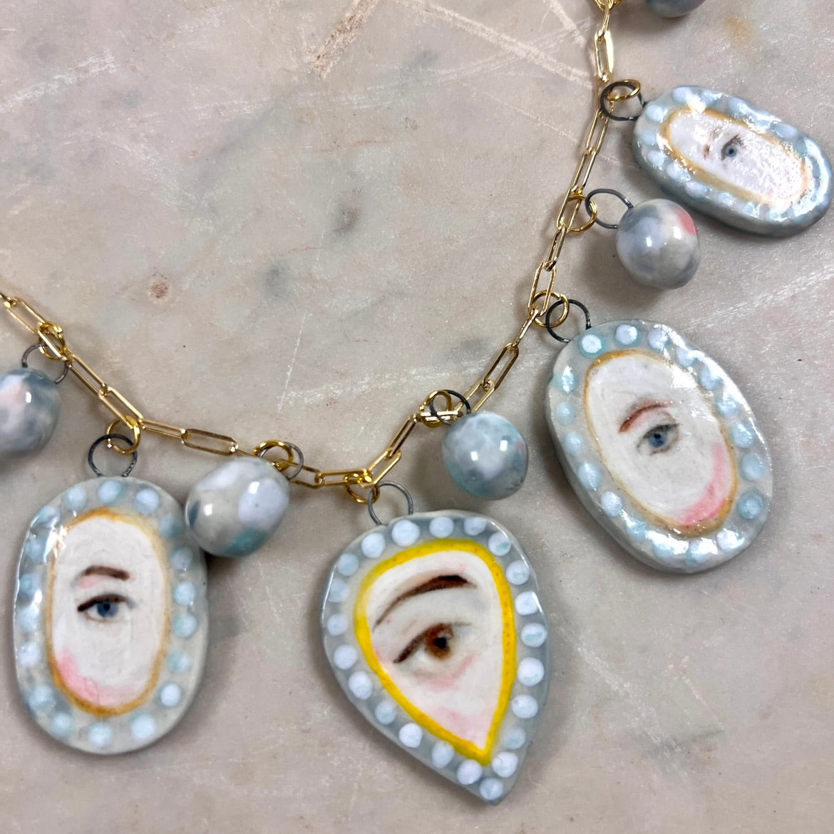 No. 82 Lover's Eye Pearl Charm Necklace with 10k Gold Chain