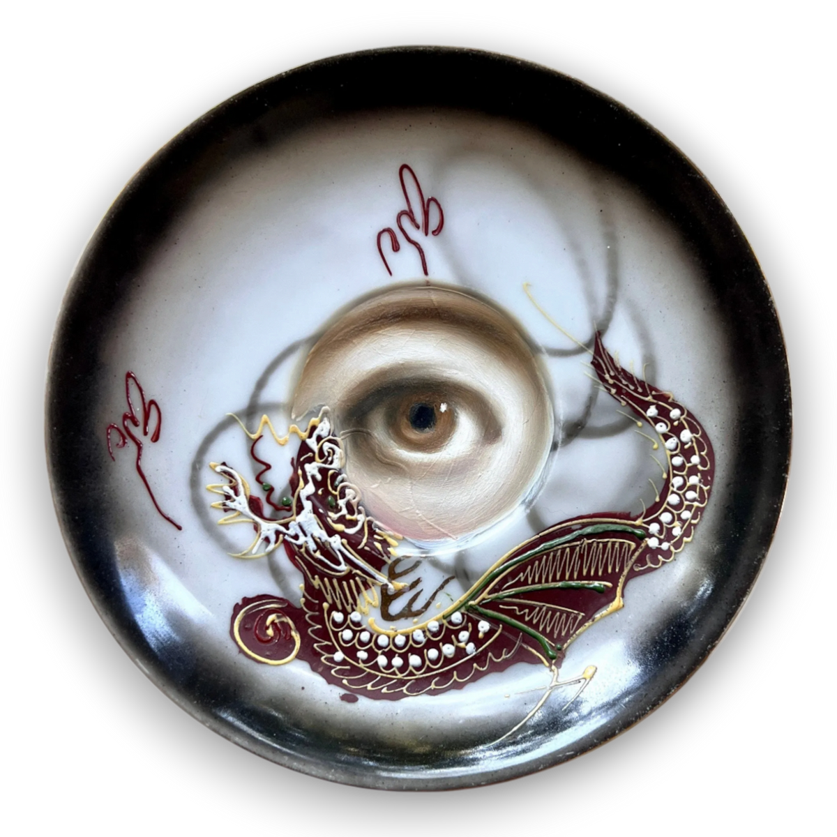 No. 3886 Lover’s Eye Painting on a Brown & Black Dragonware Plate