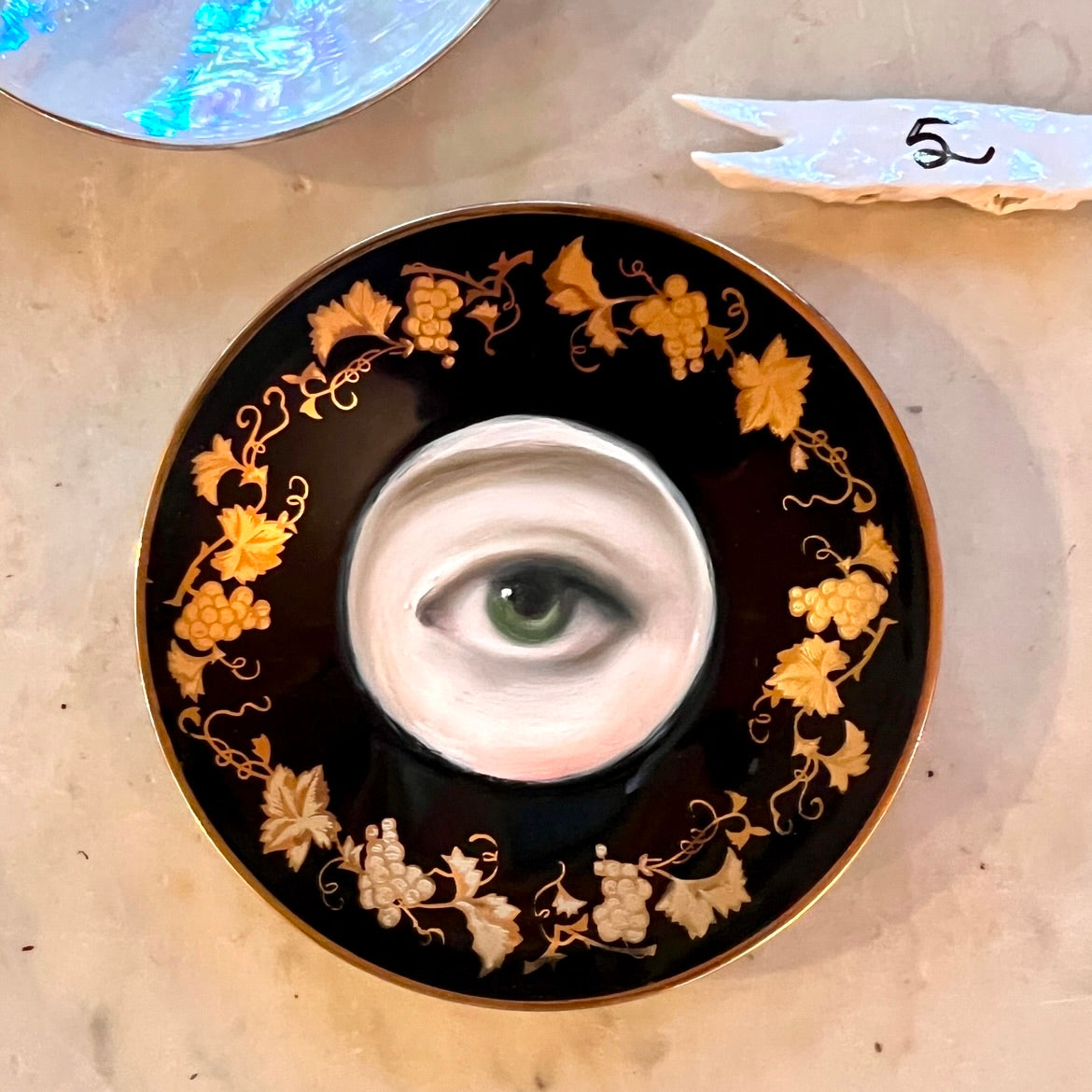 No. 3100 Lover's Eye Painting on a Gold Grapevine Plate