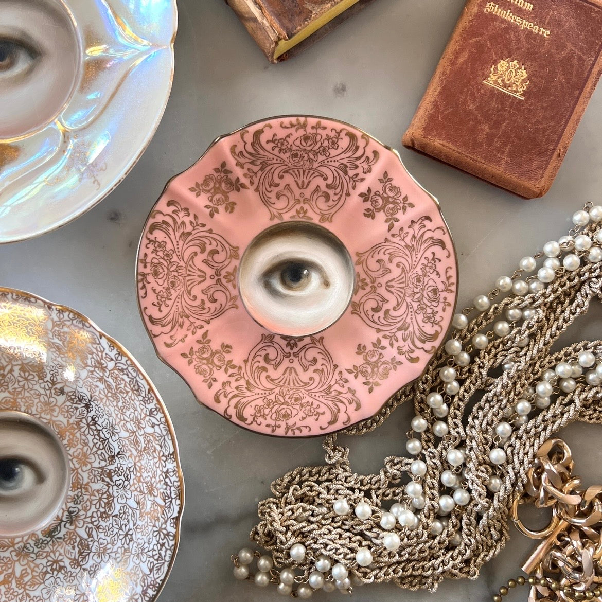 No. 3561 Lover's Eye Painting on a Pink and Gold Plate