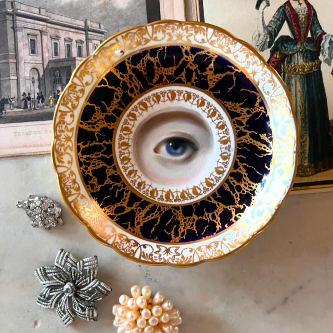 No. 2764 Lover's Eye Painting on an English Gold and Marbled Blue Plate