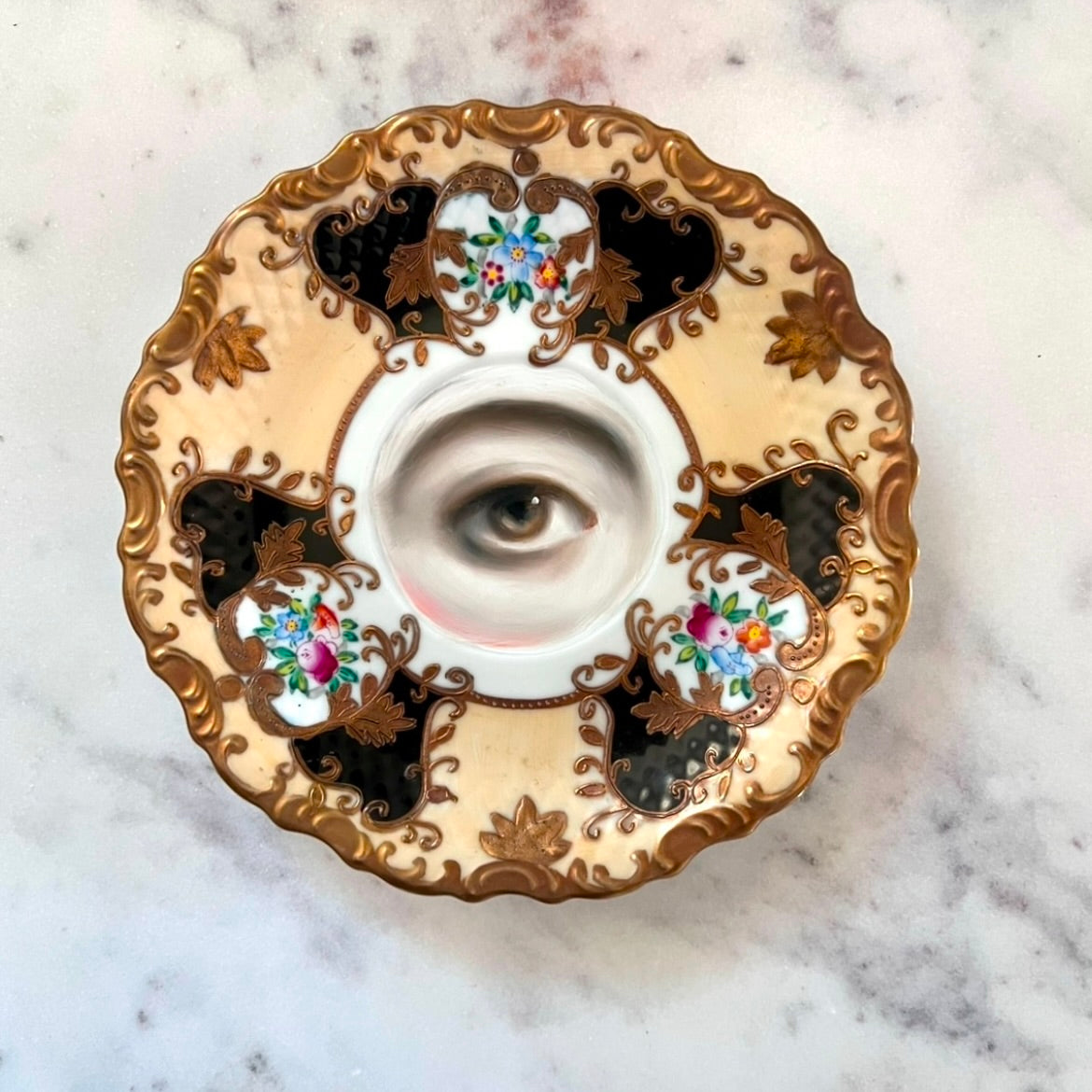 No. 2833 Lover's Eye Painting on a Cream, Black, and Gold Plate