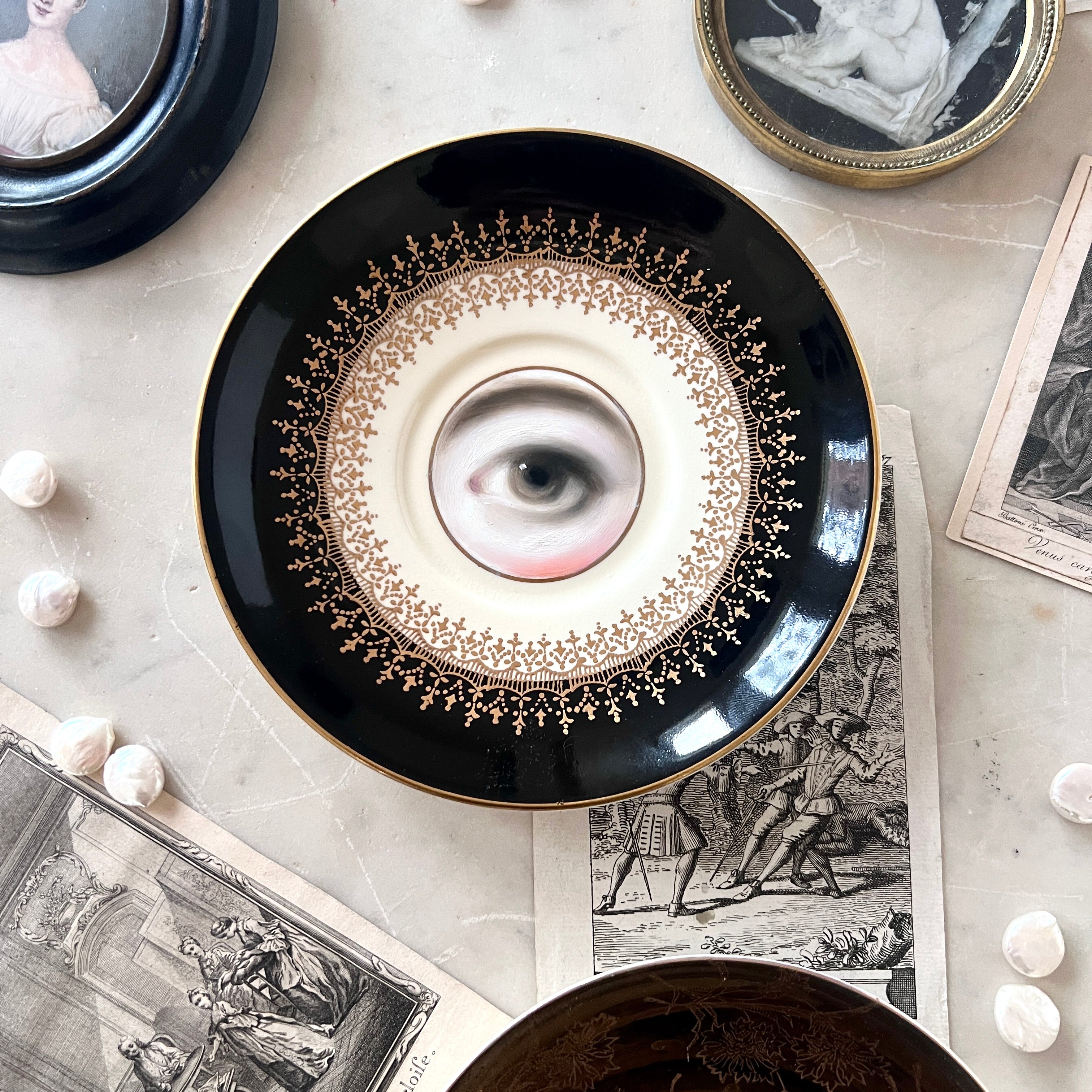 No. 3042 Lover's Eye Painting on an English "Elizabethan" Black & Gold Plate