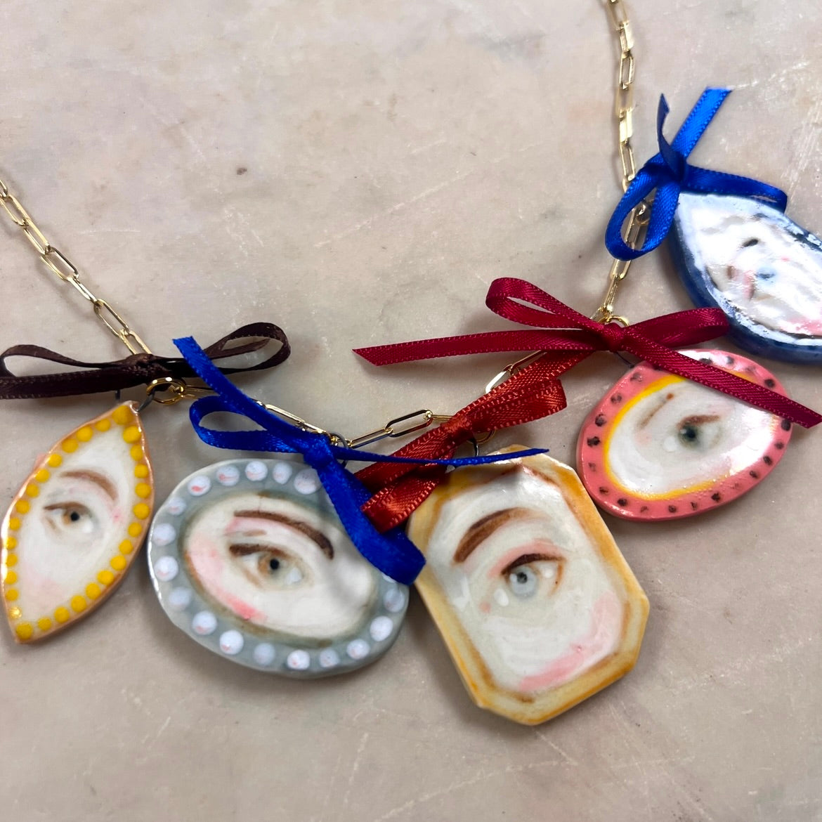 No. 144 Lover's Eye Beribboned Charm Necklace with 10k Gold Chain