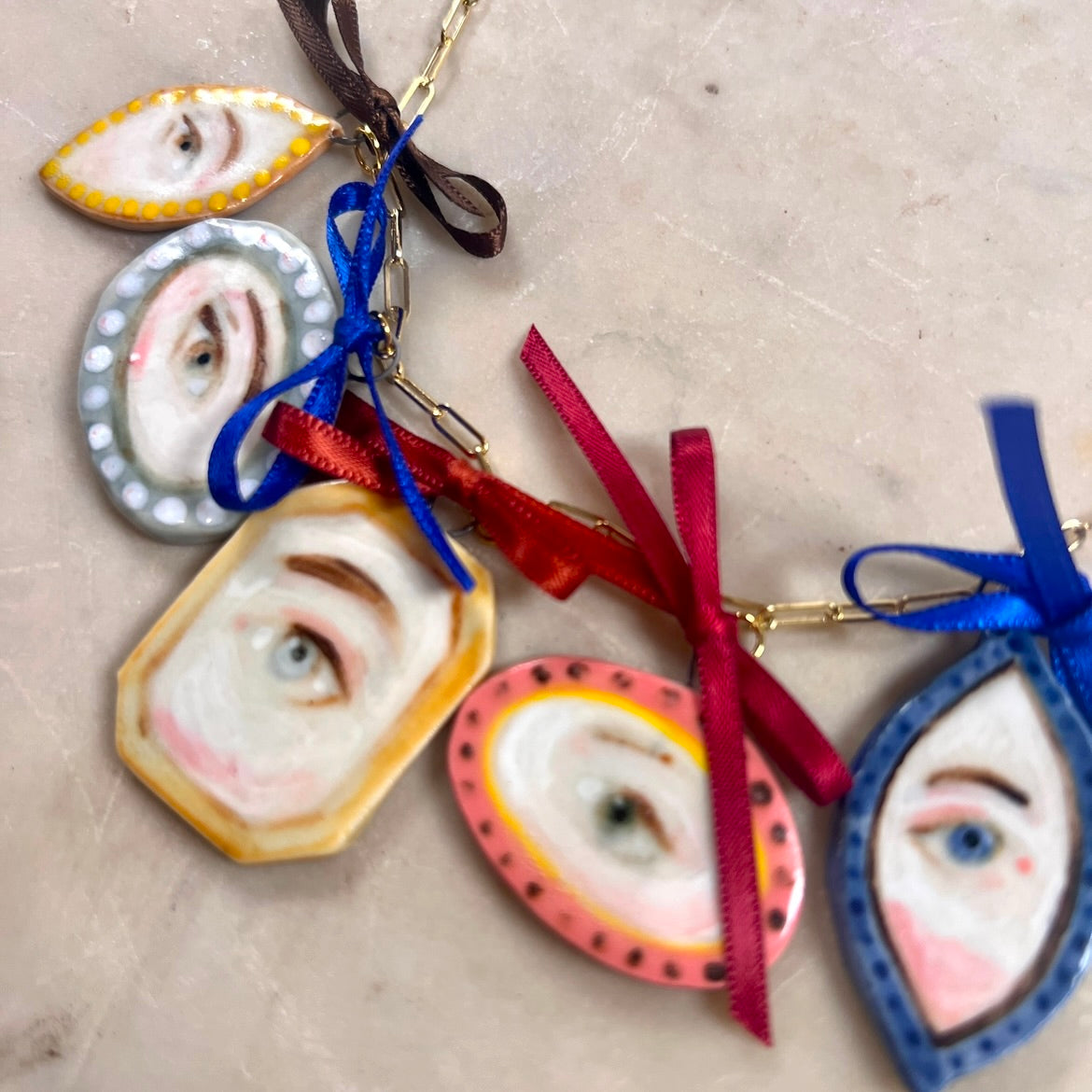 No. 144 Lover's Eye Beribboned Charm Necklace with 10k Gold Chain