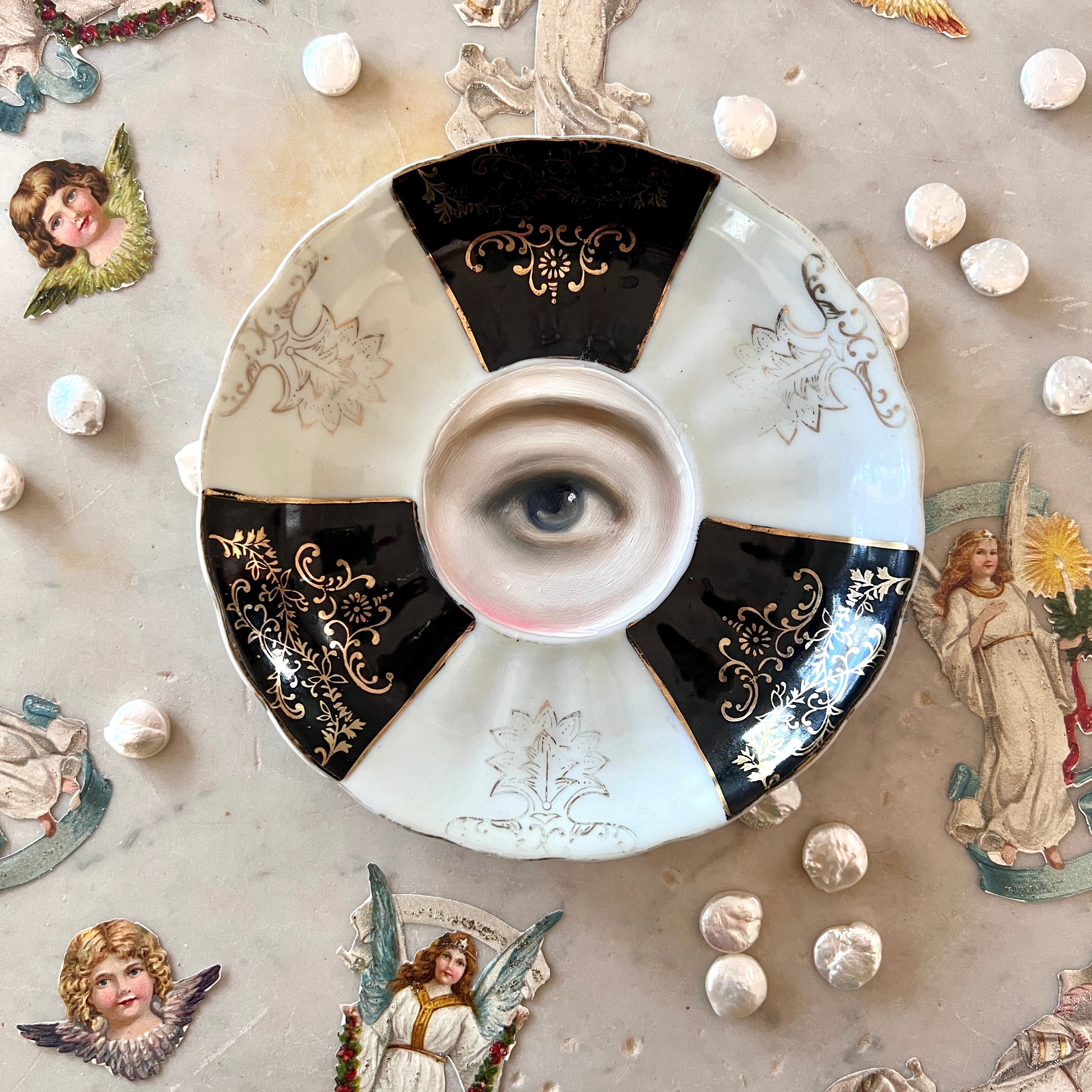 No. 3085 Lover's Eye Painting on a Black, White, & Gold Plate