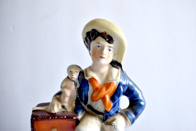 Antique Mid-19th-Century Staffordshire Figurine of a Boy, Monkey, and Organ Grinder