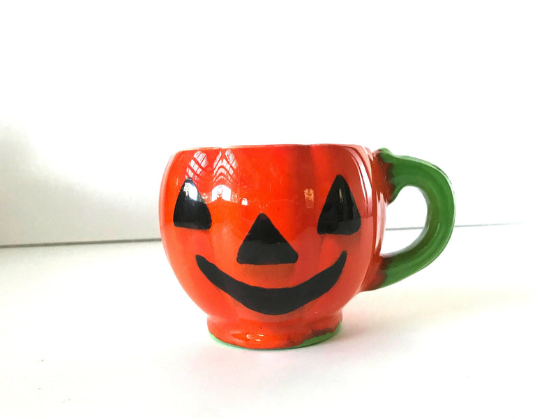 Vintage Halloween Orange, Green, and Black Child's Jack-o'-Lantern Carved Pumpkin Mug